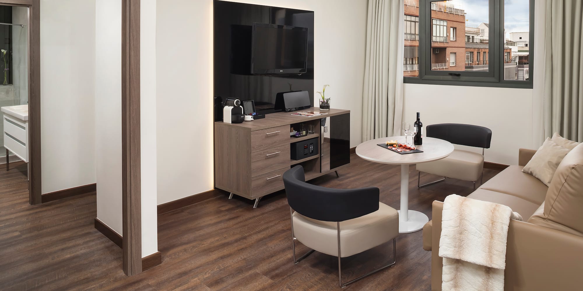 a room with a tv and a table