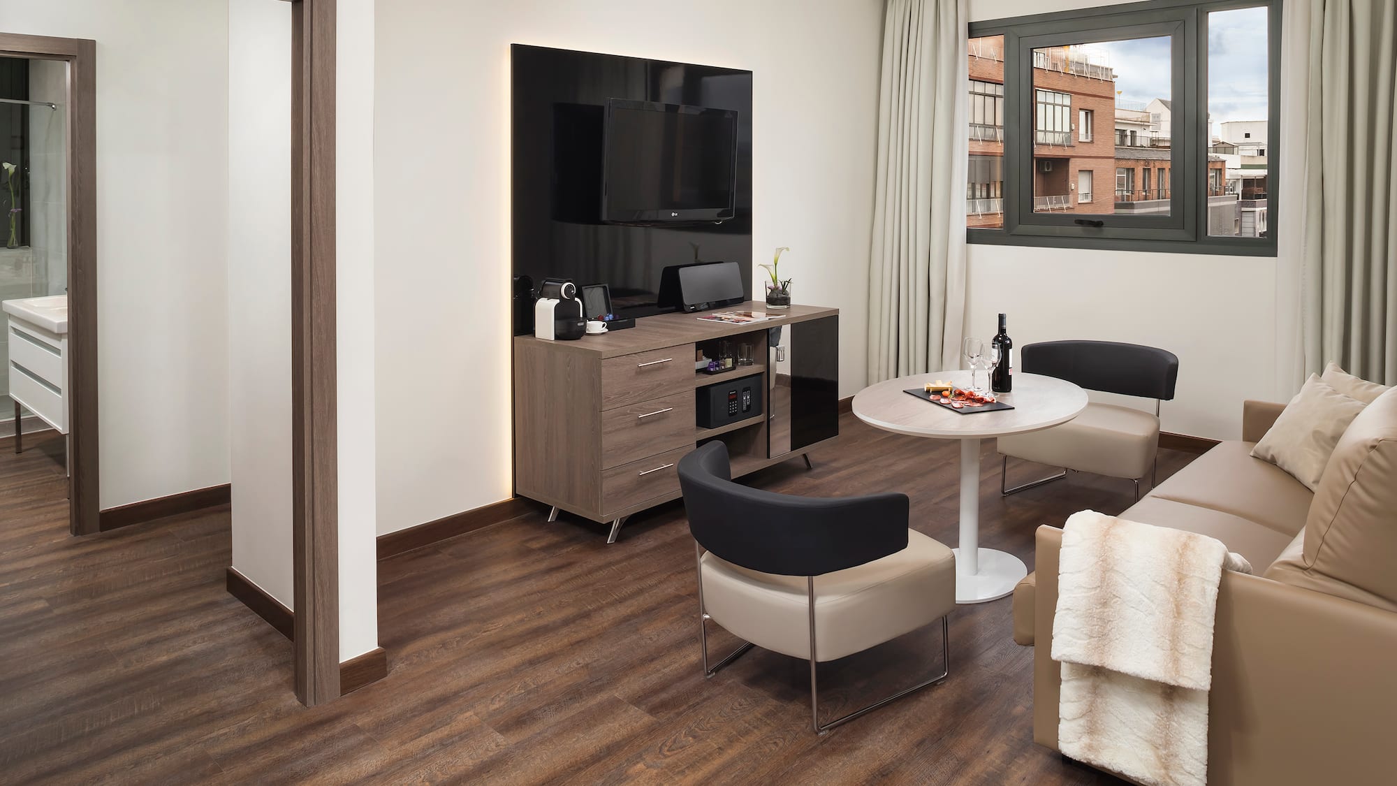 a room with a tv and a table