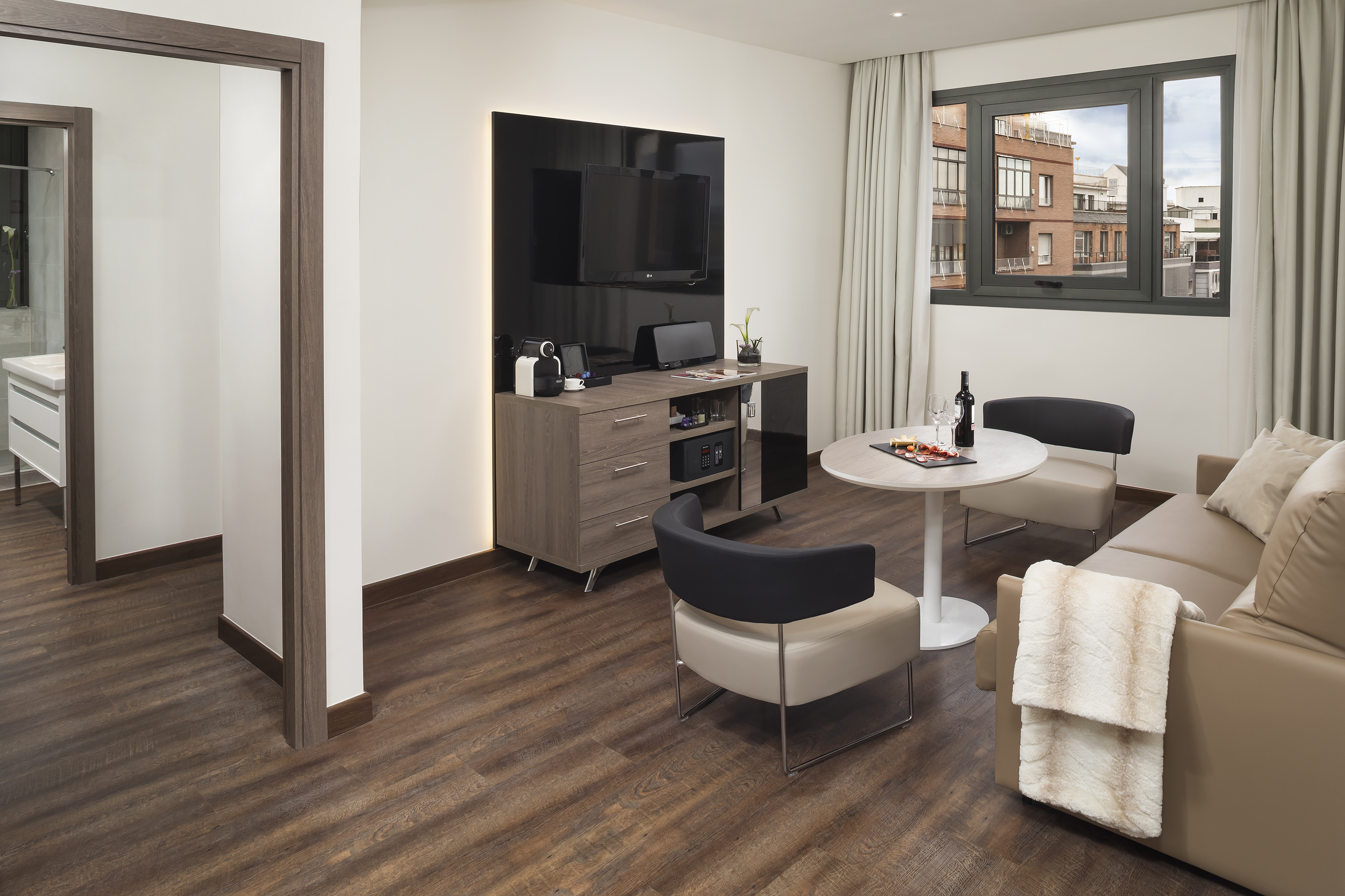 a room with a tv and a table