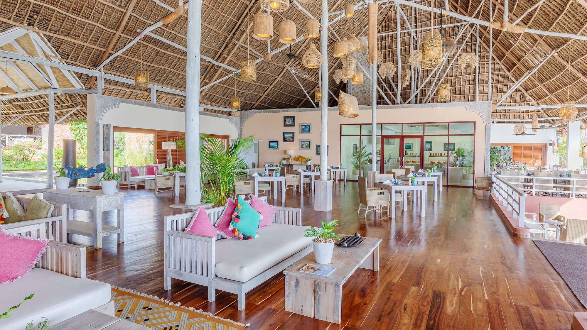 a room with a large ceiling and a large white couch