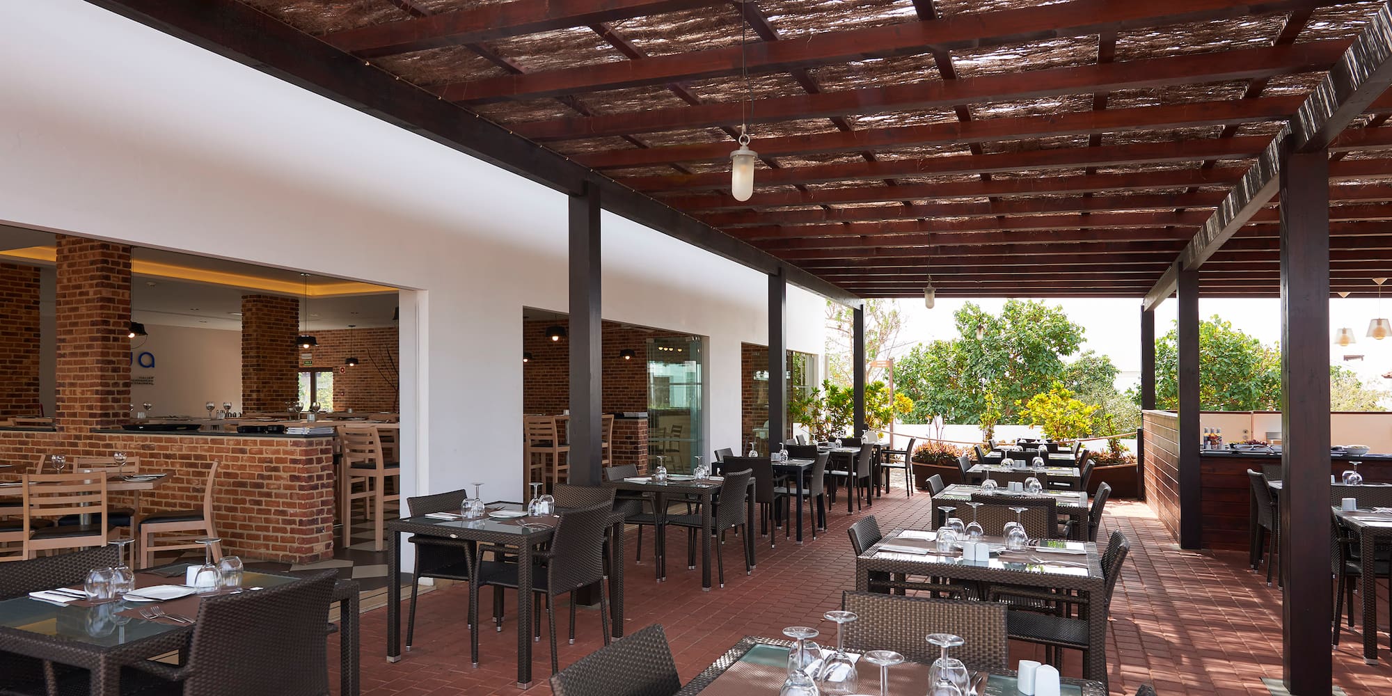 a restaurant with tables and chairs