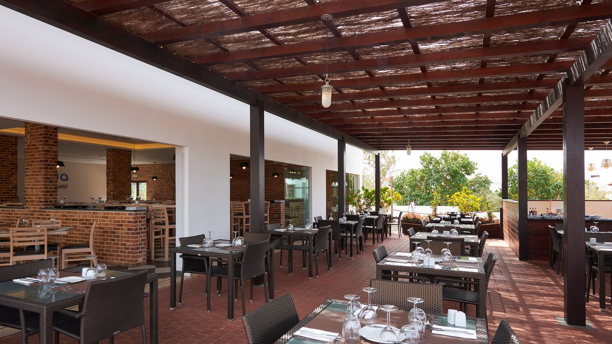 a restaurant with tables and chairs
