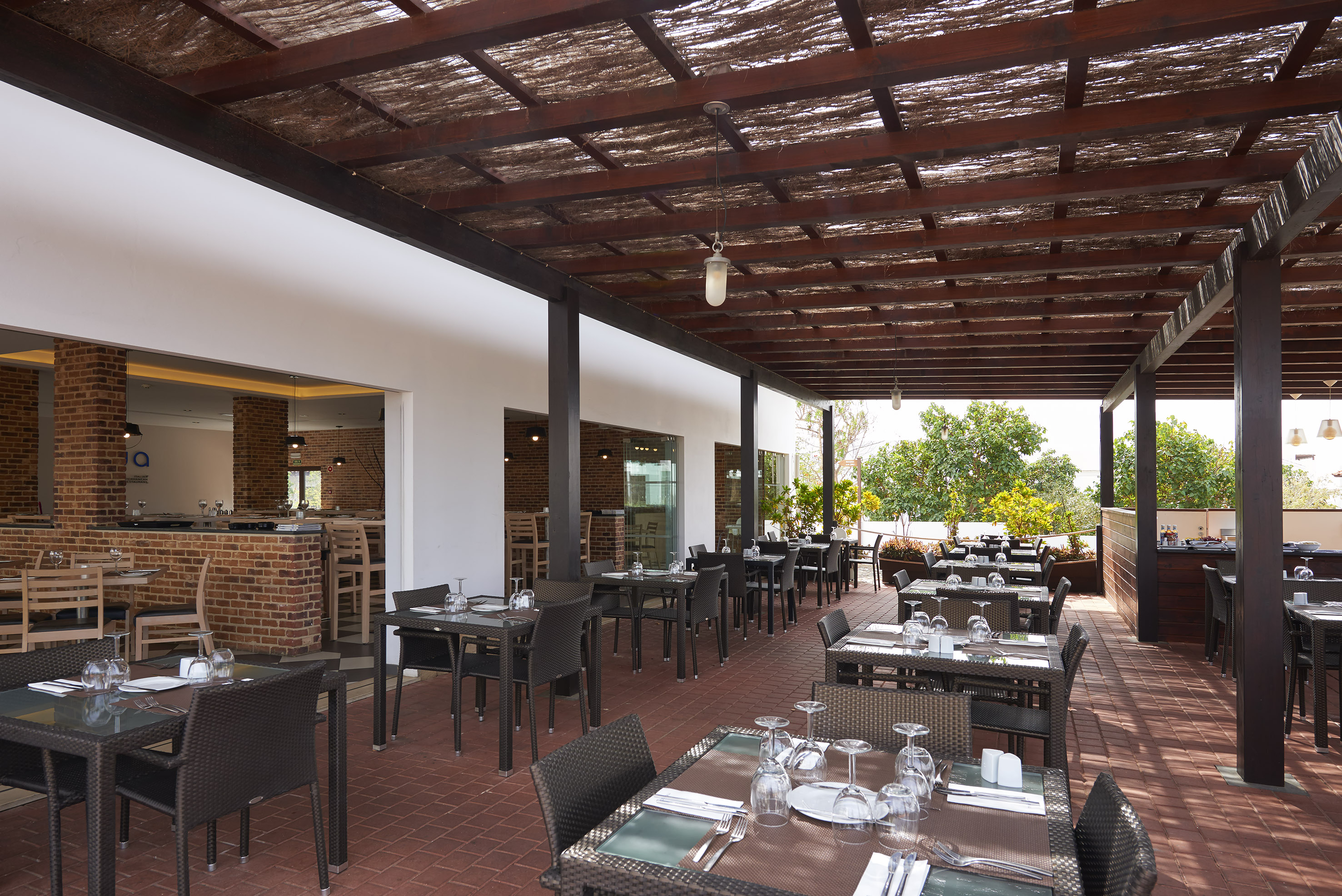 a restaurant with tables and chairs