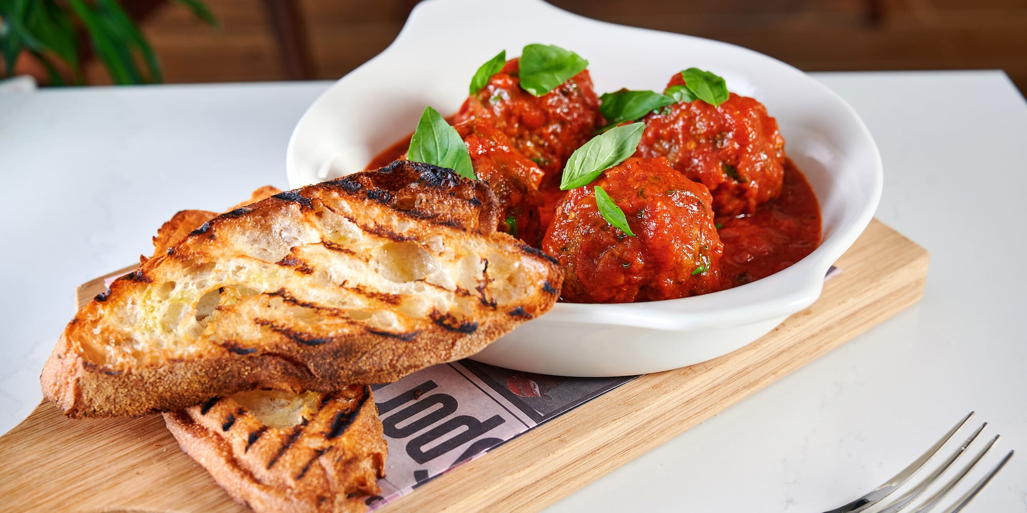 a plate of food on a cutting board