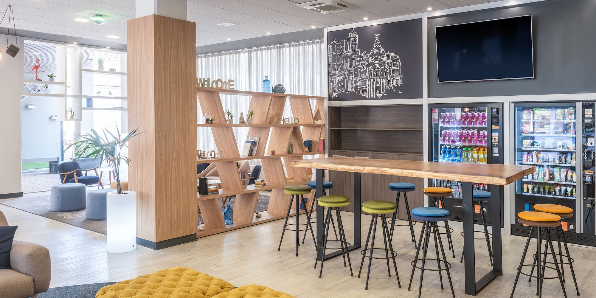 a room with a table and stools