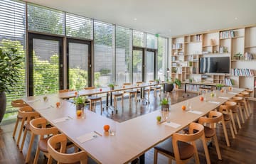 a room with tables and chairs