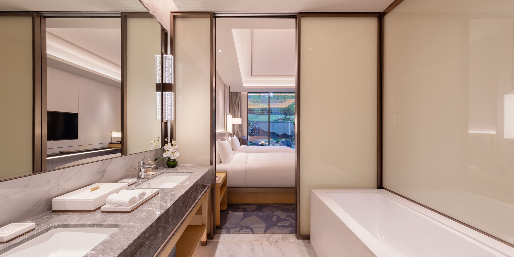 a bathroom with a bathtub and sink