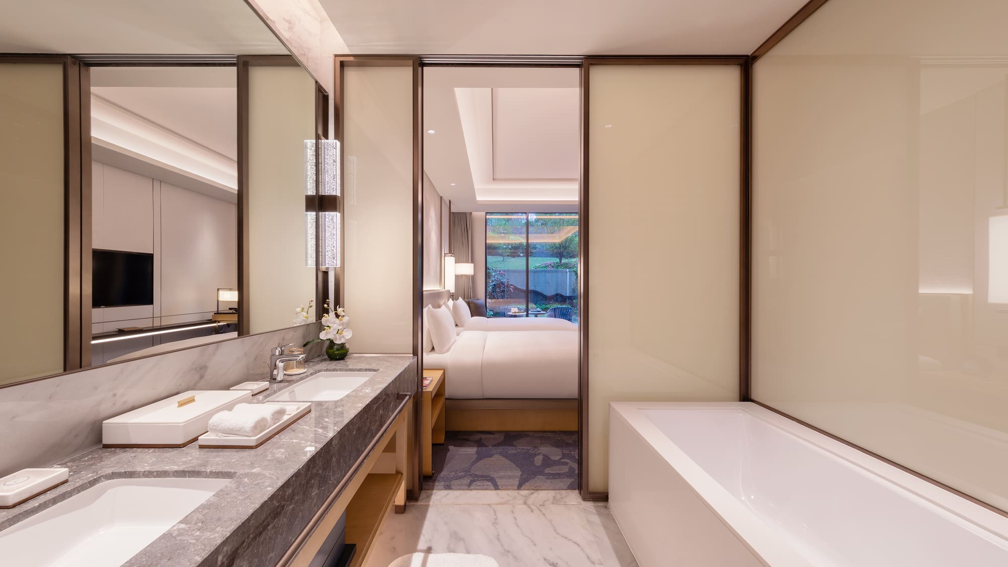 a bathroom with a bathtub and sink