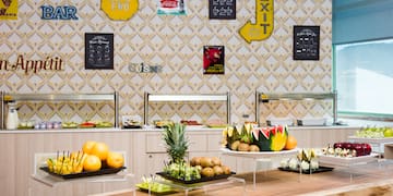 a buffet with fruit on a table