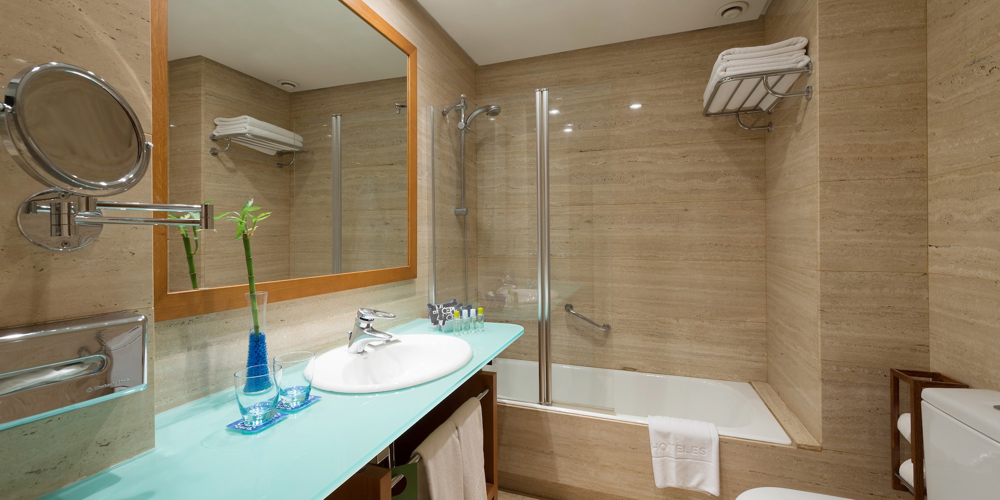 a bathroom with a mirror and a sink