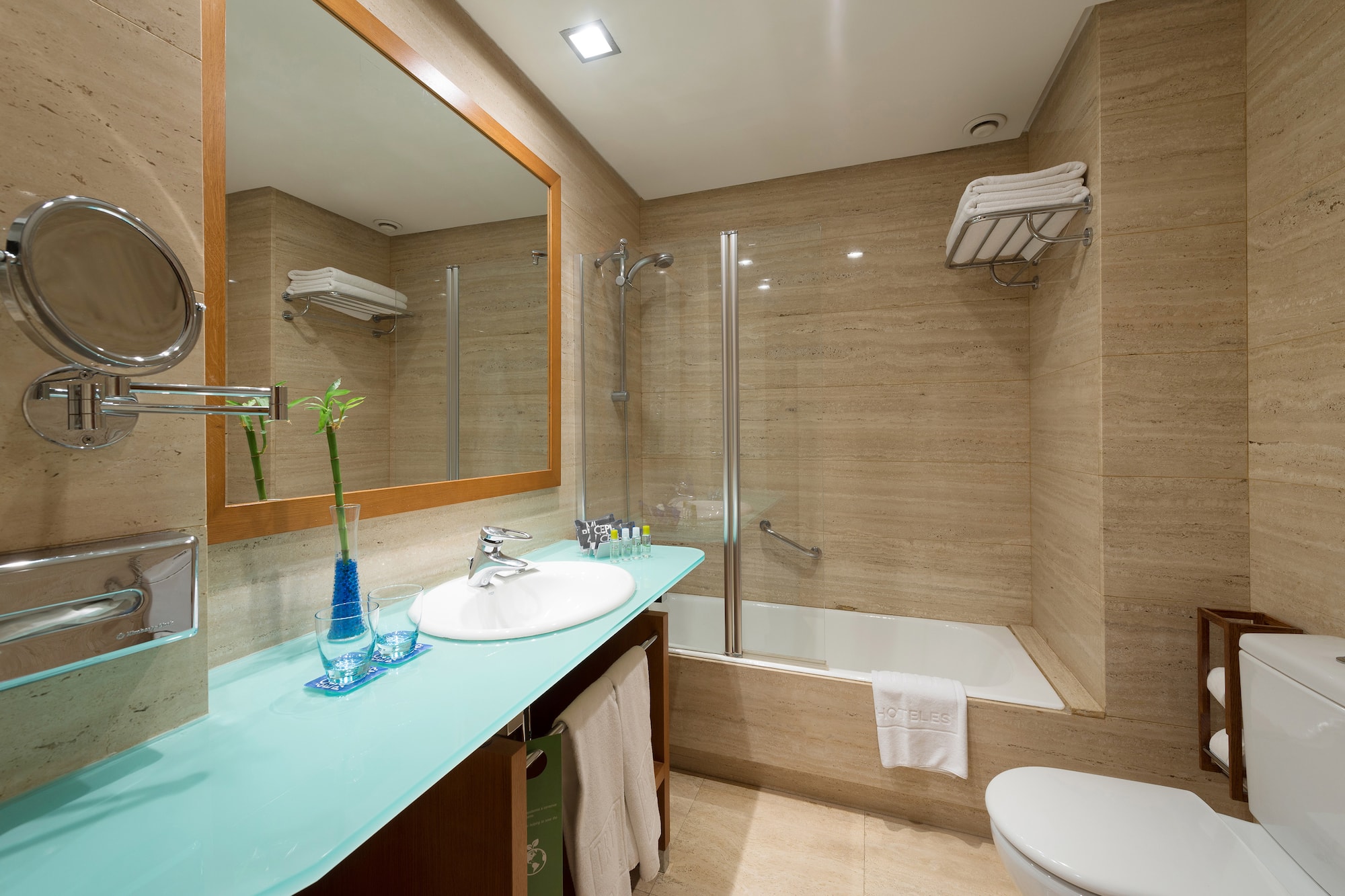 a bathroom with a mirror and a sink