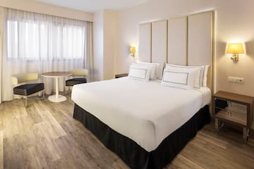 a room with a bed and a table