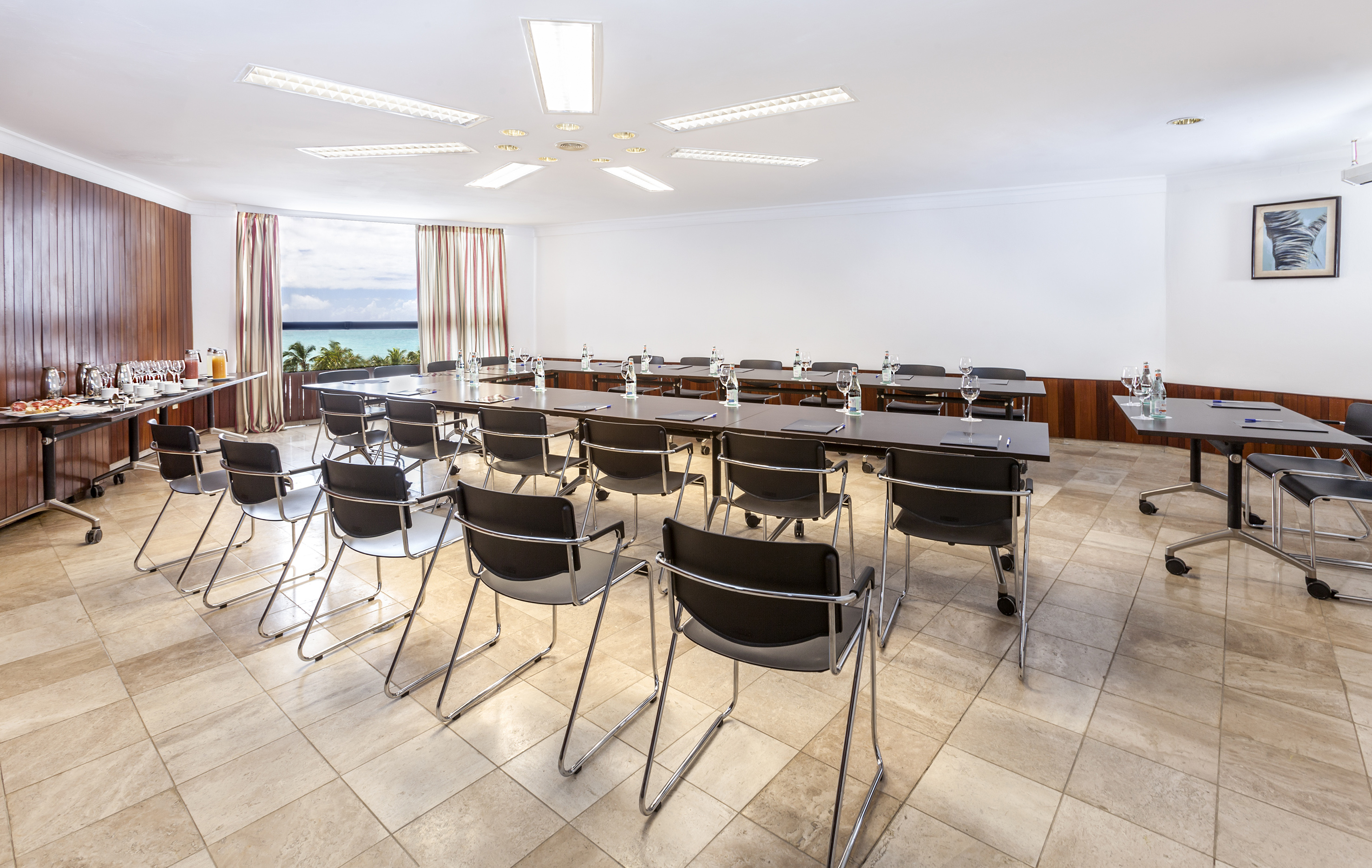 a room with chairs and tables