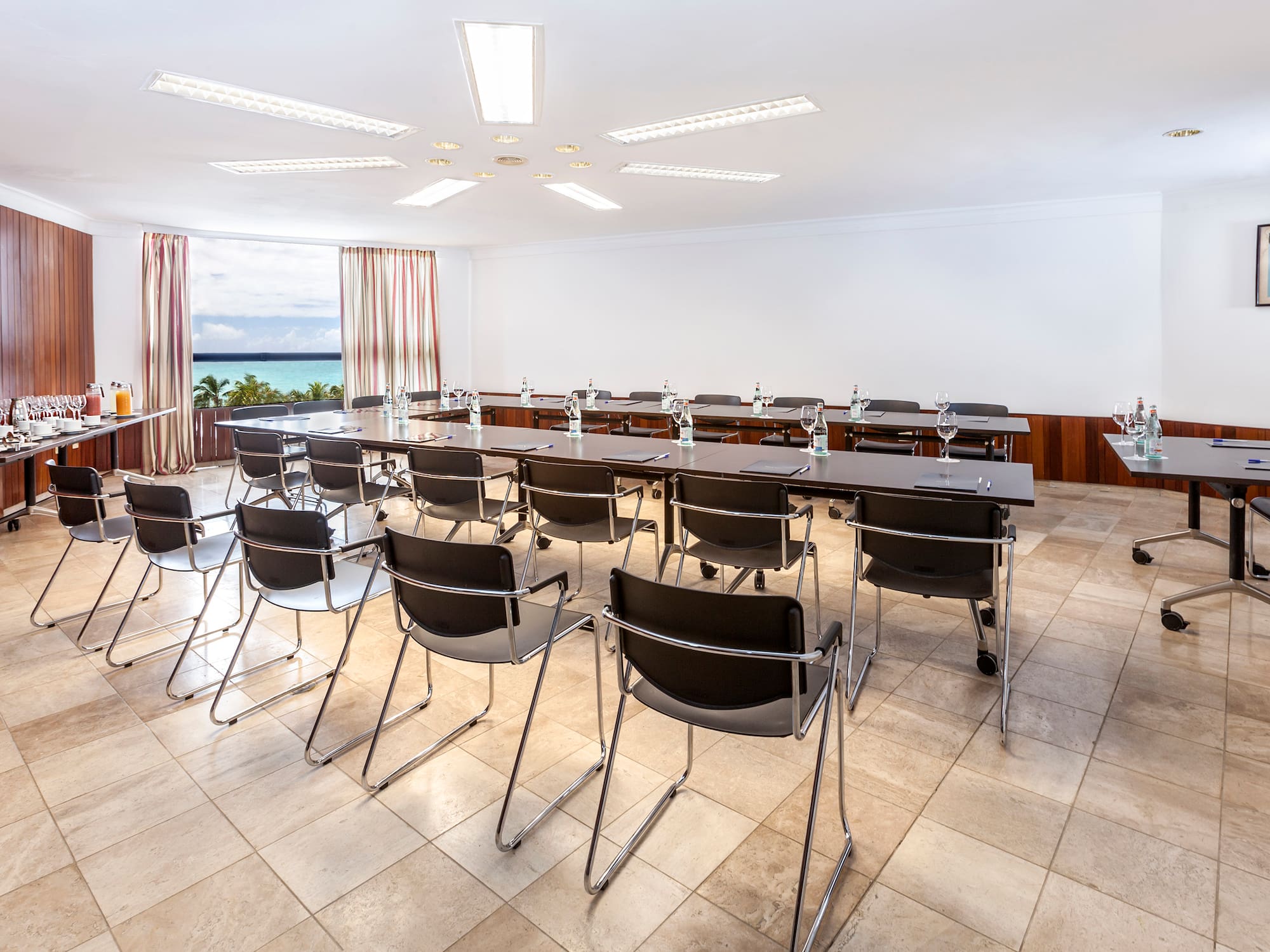 a room with chairs and tables
