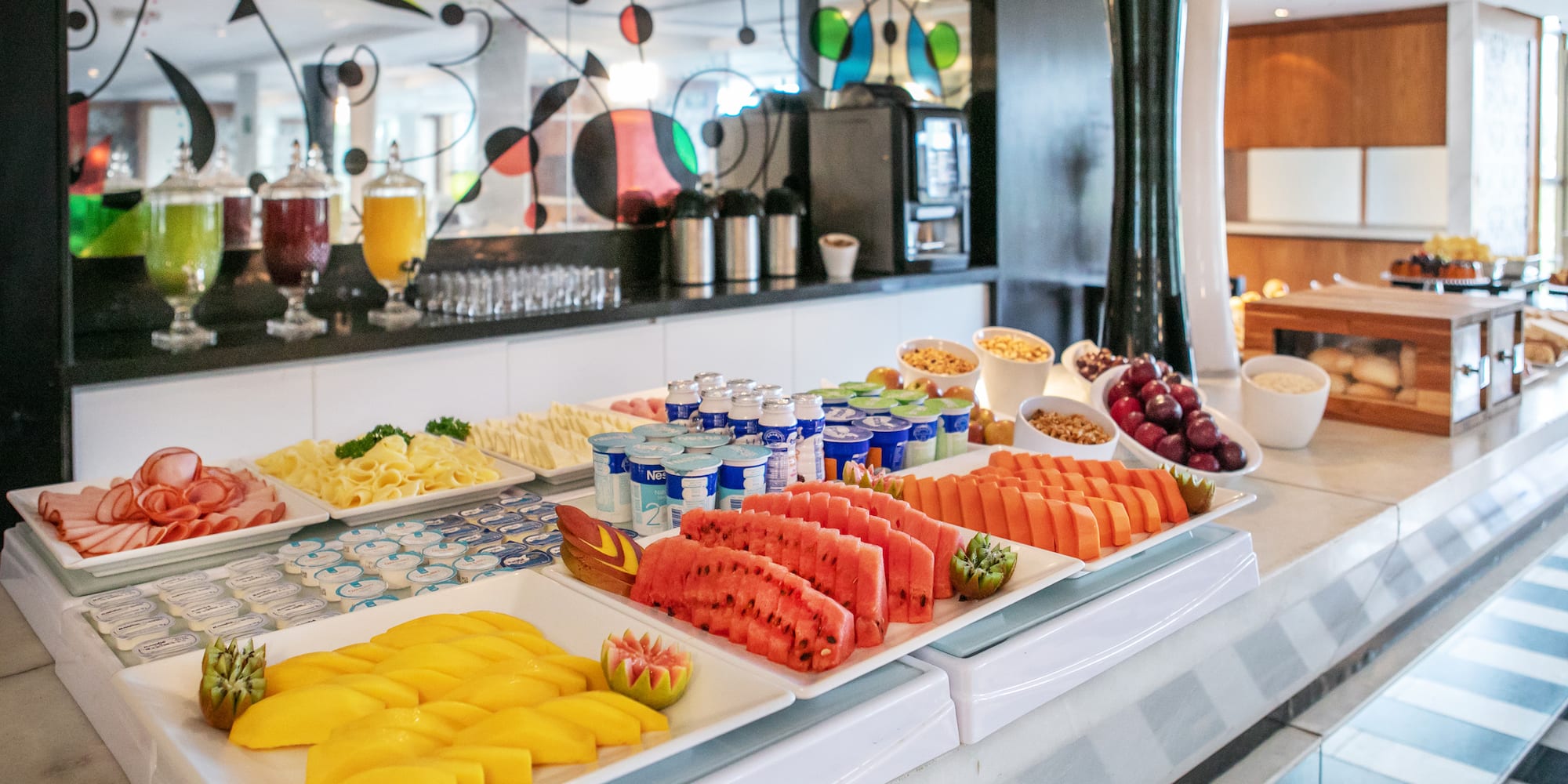 a buffet table with different types of food