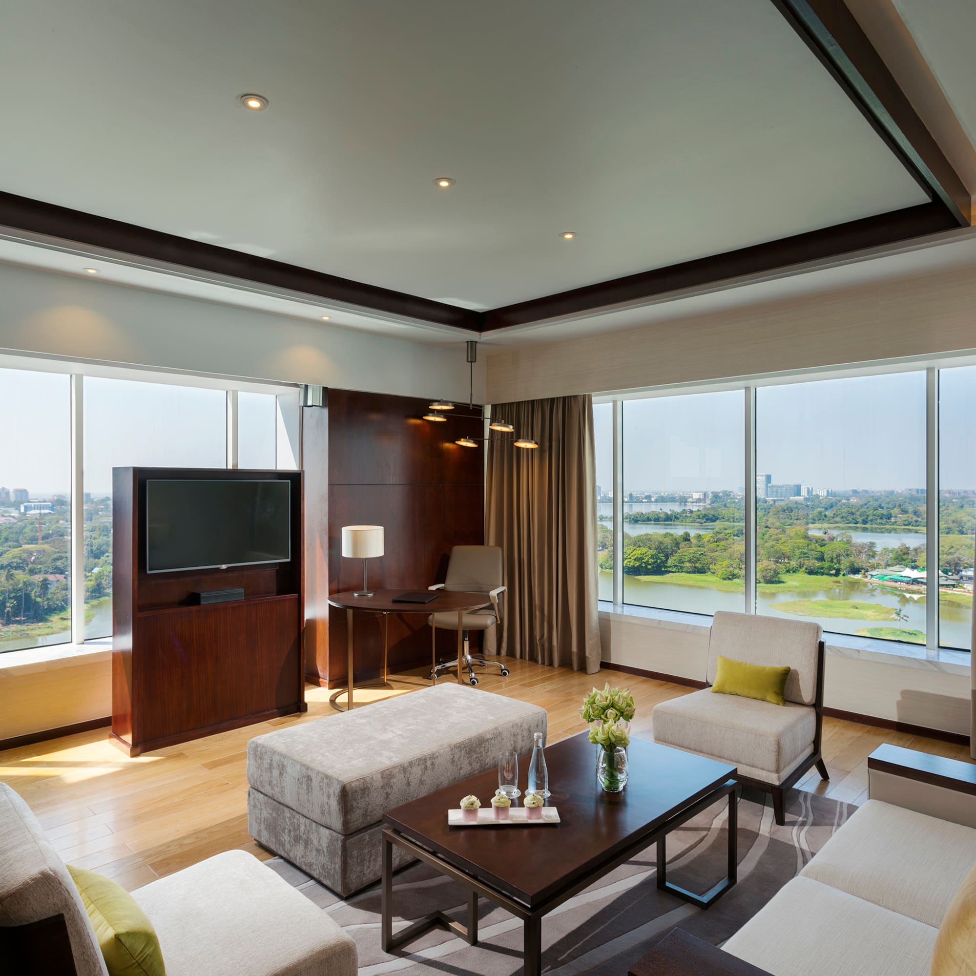 a room with a television and couches