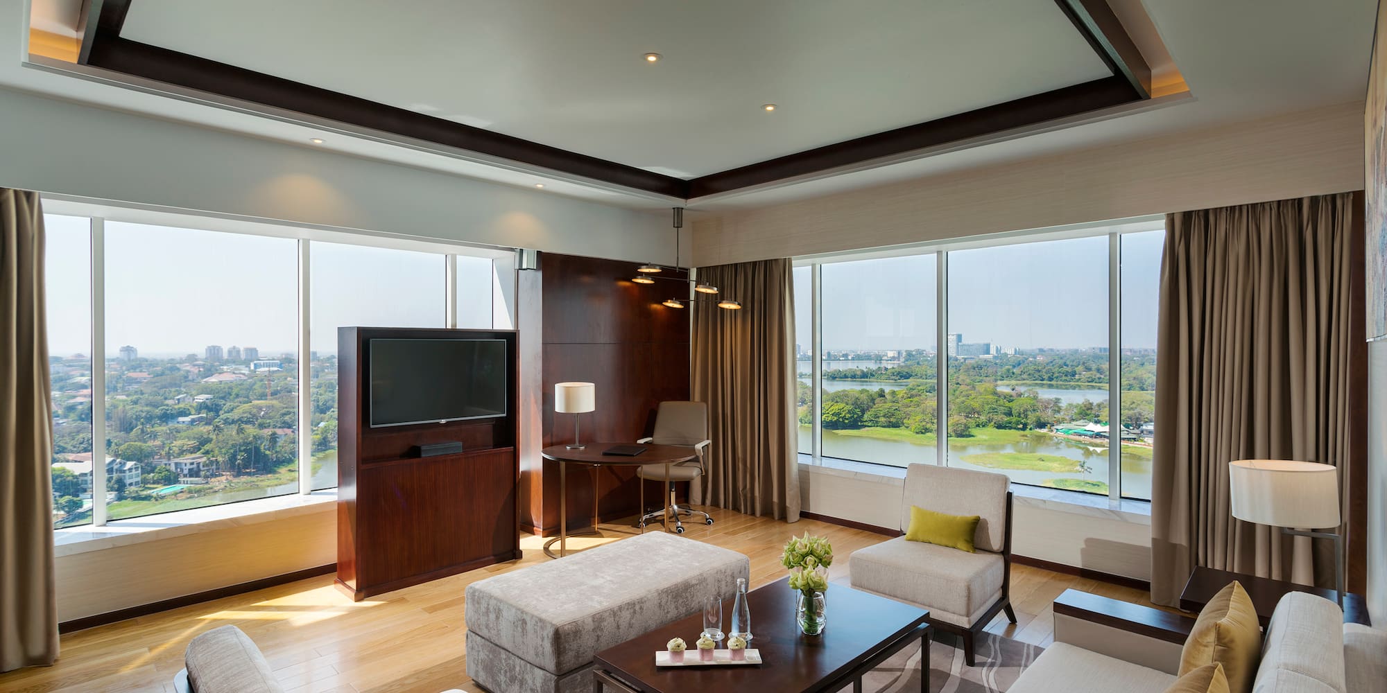 a room with a television and couches
