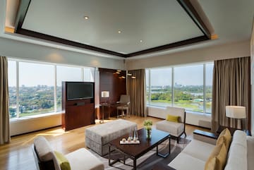 a room with a television and couches
