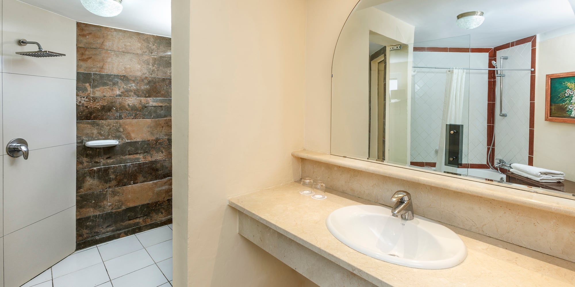 a bathroom with a large mirror