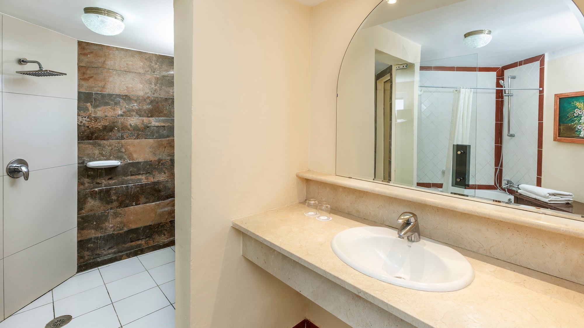 a bathroom with a large mirror