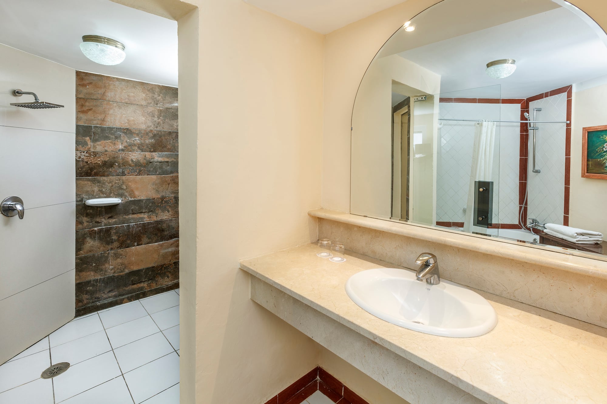 a bathroom with a large mirror