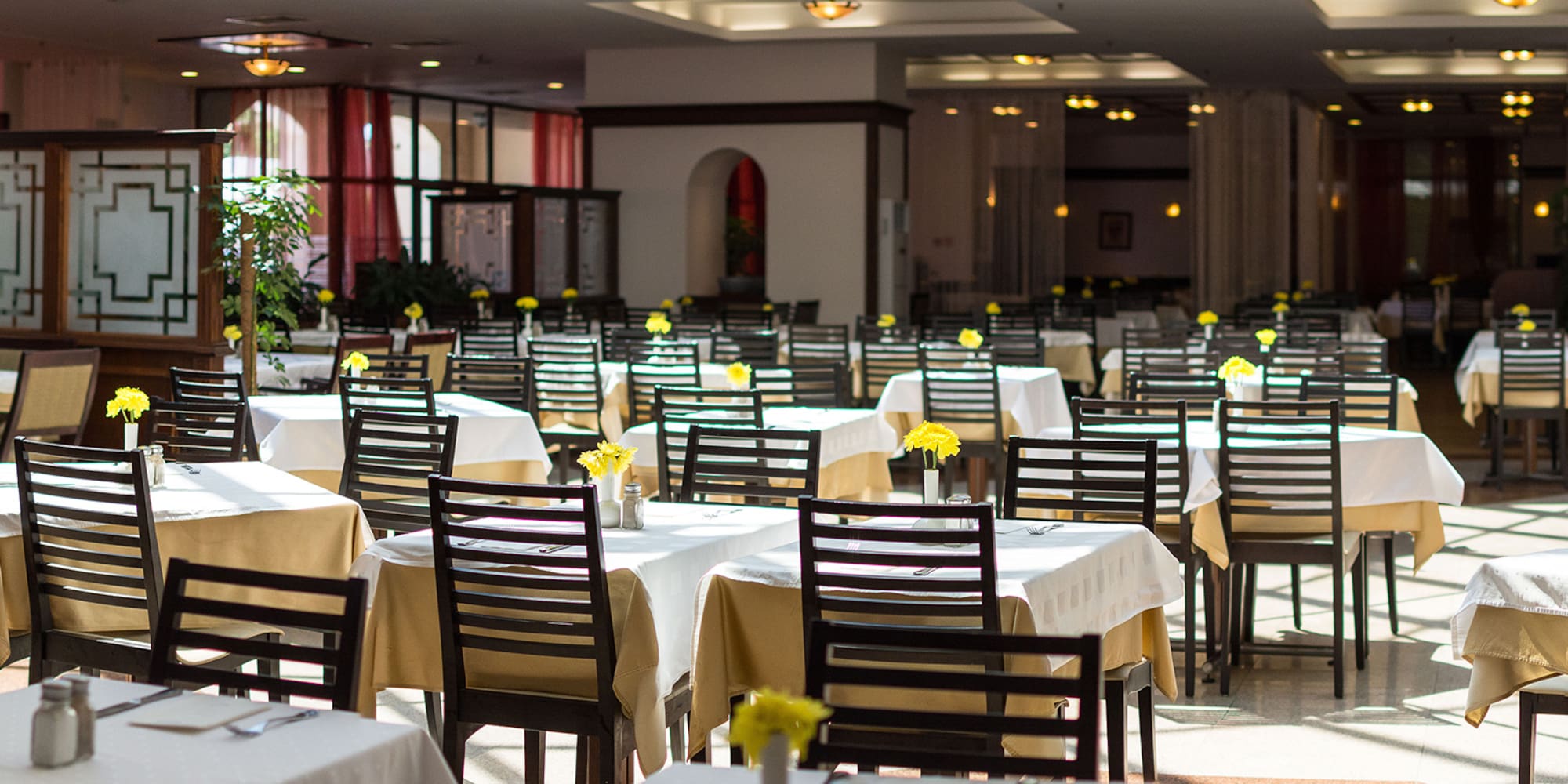 a room with tables and chairs