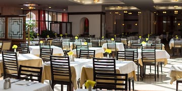 a room with tables and chairs