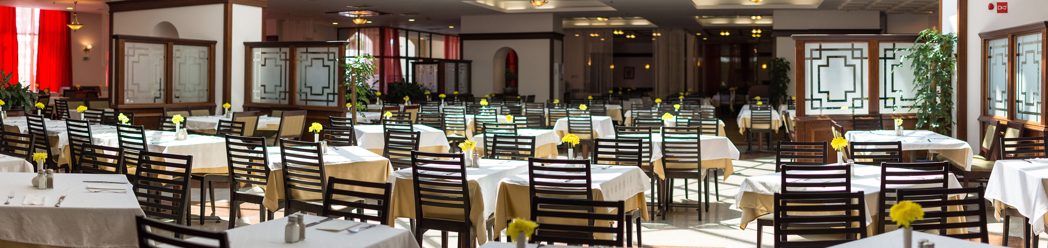 a room with tables and chairs