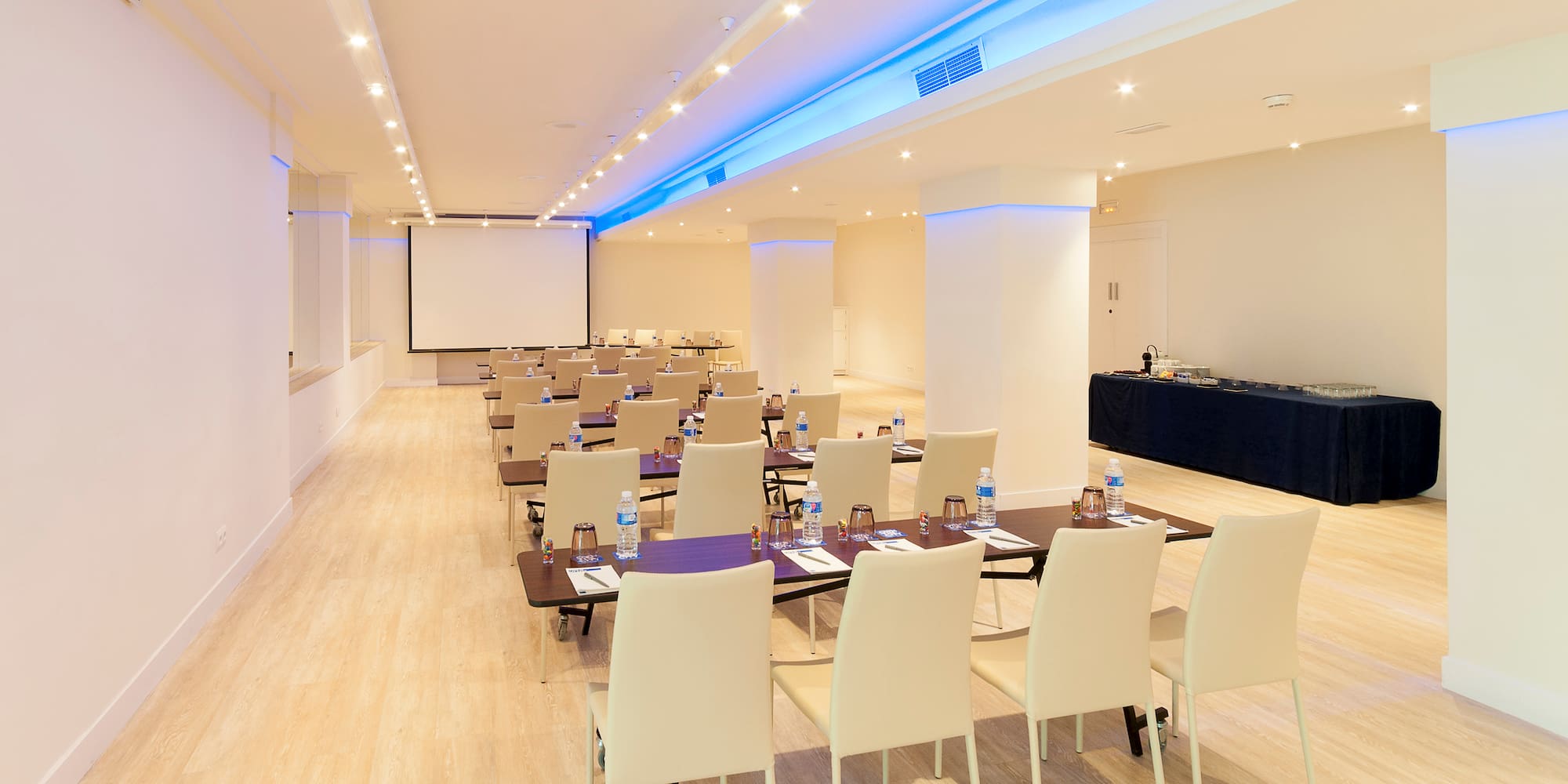 a room with tables and chairs