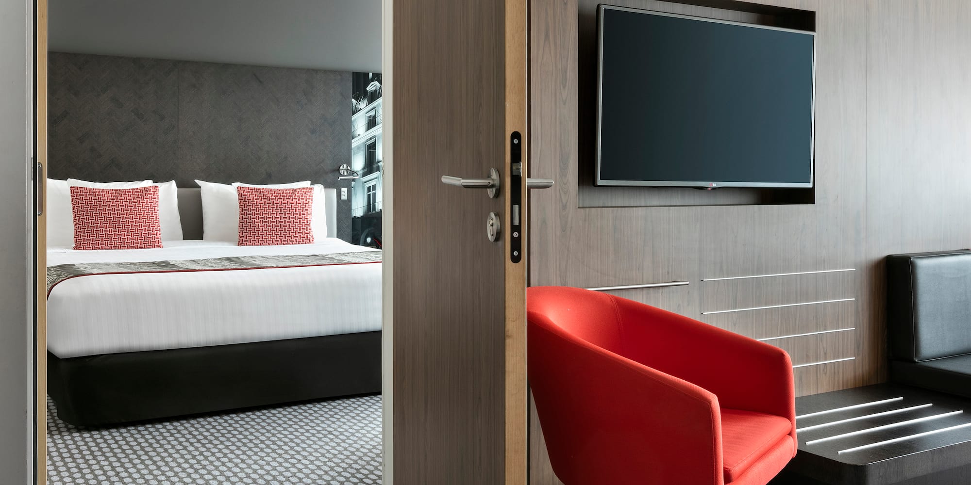 a room with a tv and a chair