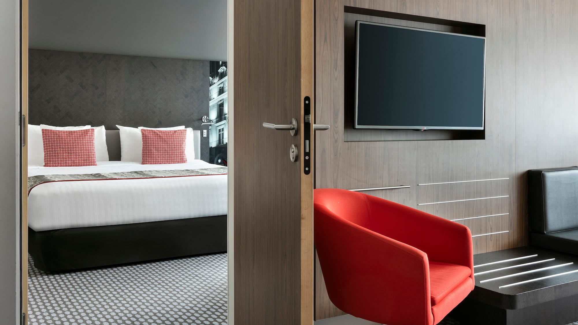 a room with a tv and a chair