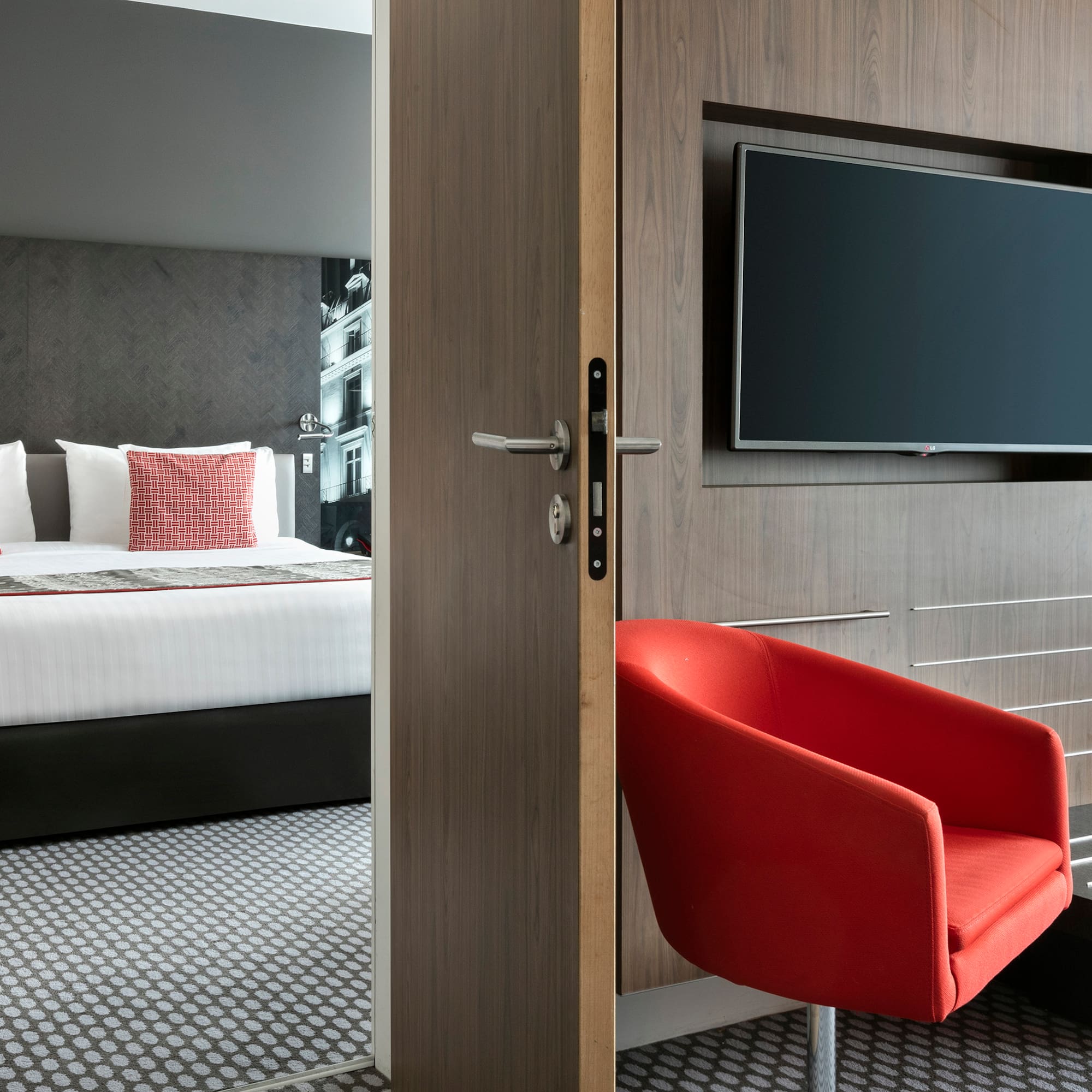 a room with a tv and a chair