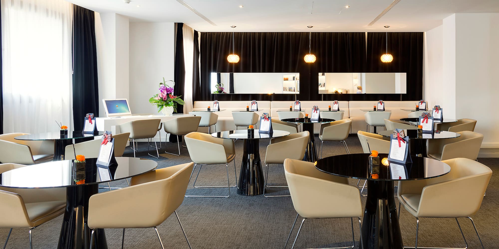 a room with tables and chairs