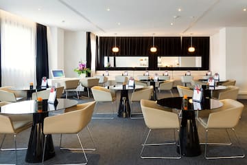 a room with tables and chairs