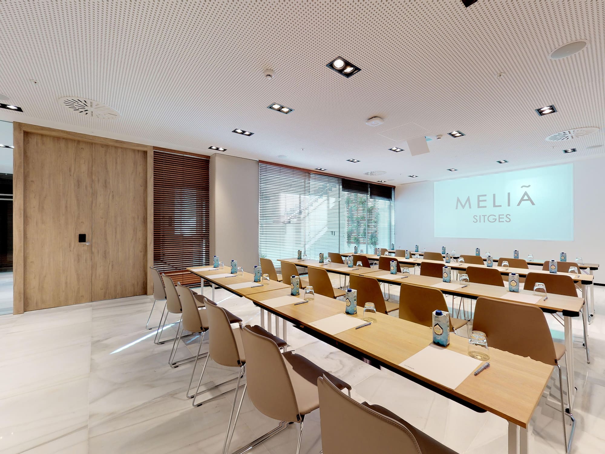 a room with tables and chairs