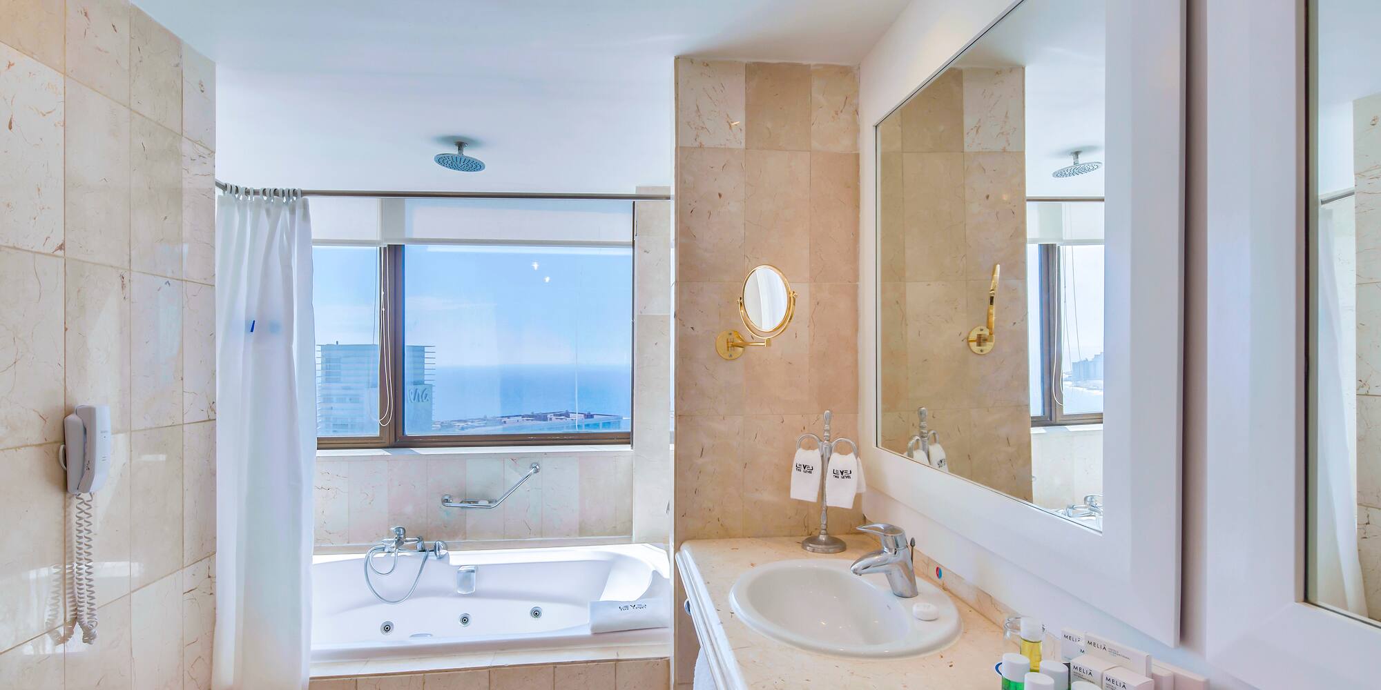 a bathroom with a bathtub and a sink