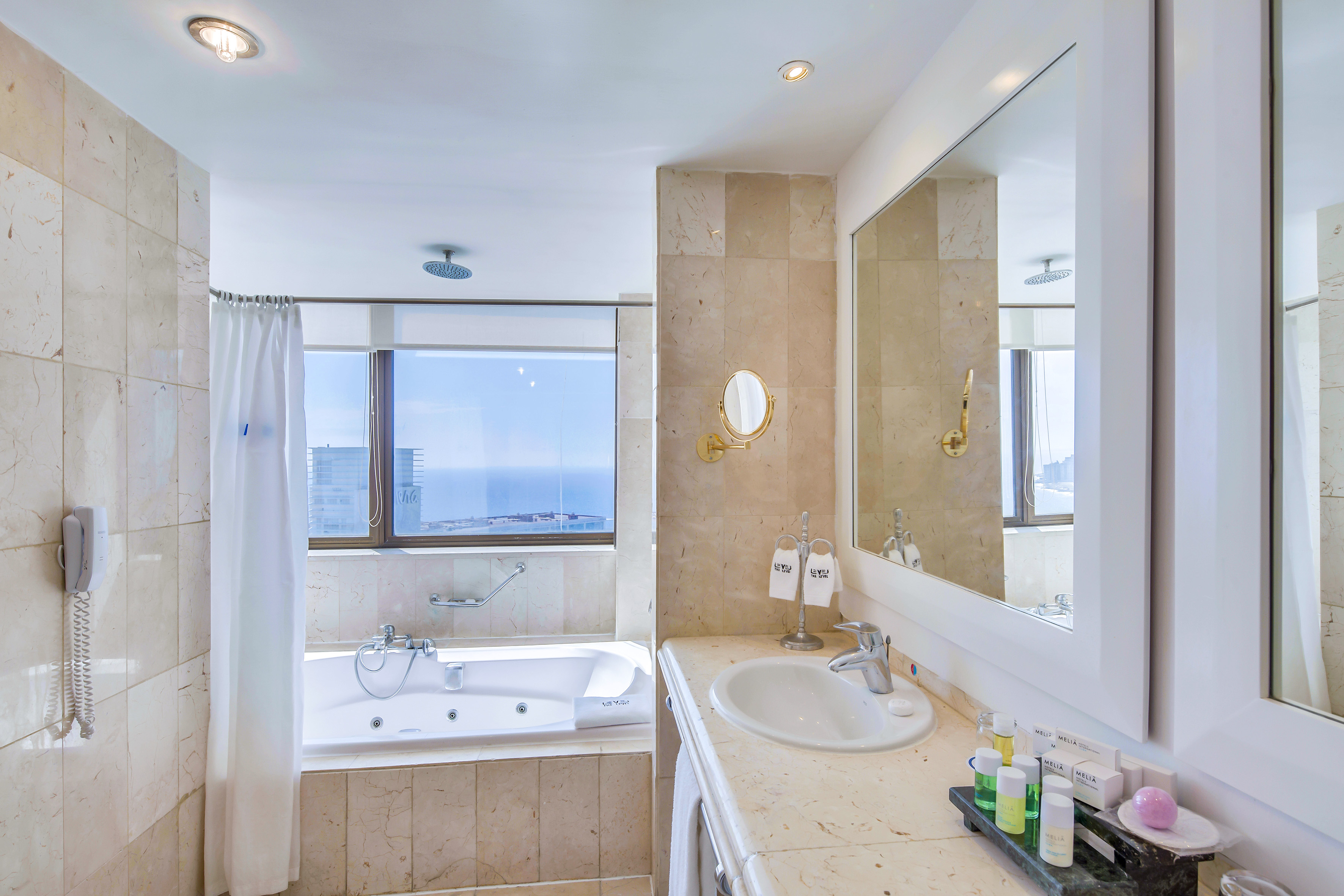 a bathroom with a bathtub and a sink