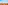 a city with satellite dishes and mountains in the background