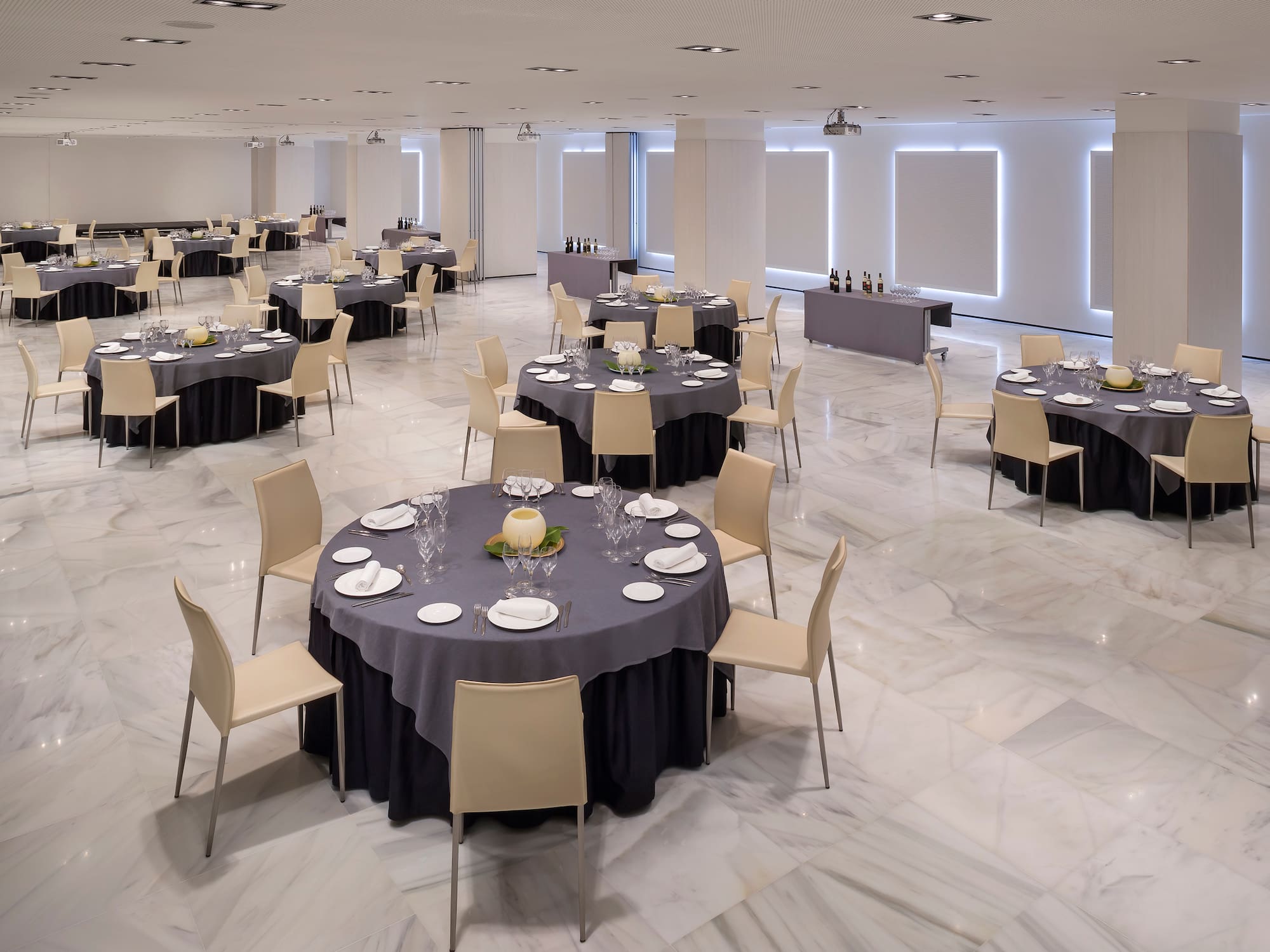 a large room with tables and chairs