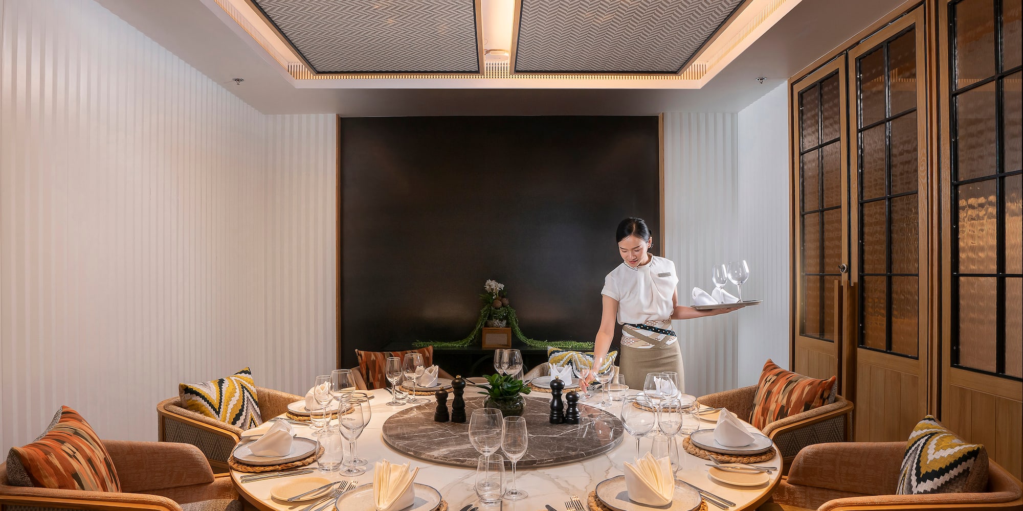 a woman serving a table