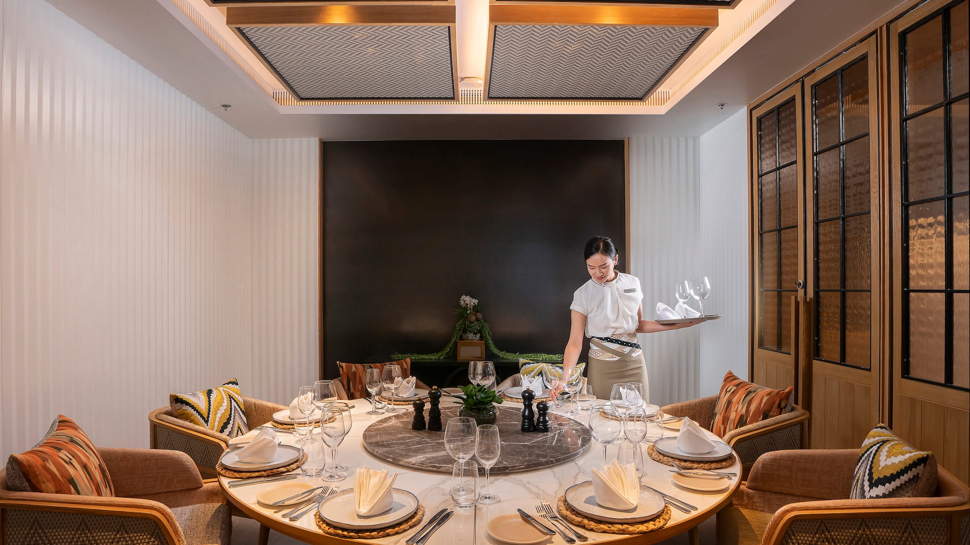 a woman serving a table