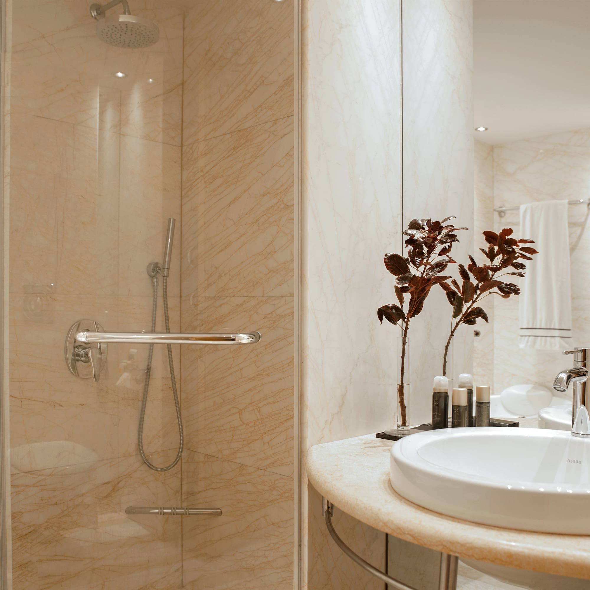 a bathroom with a sink and shower