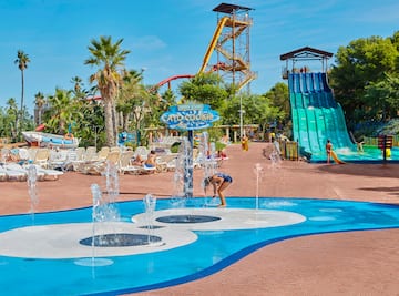 a water park with a water slide and a water slide