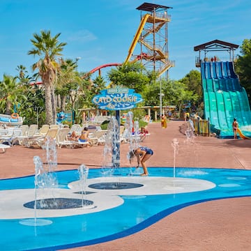 a water park with a water slide and a water slide