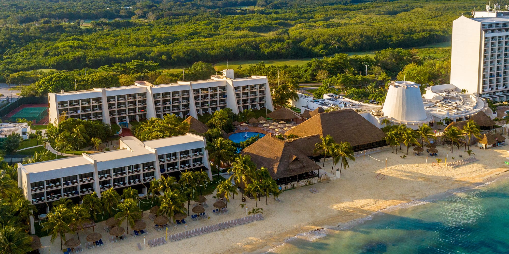 a resort with a pool and trees