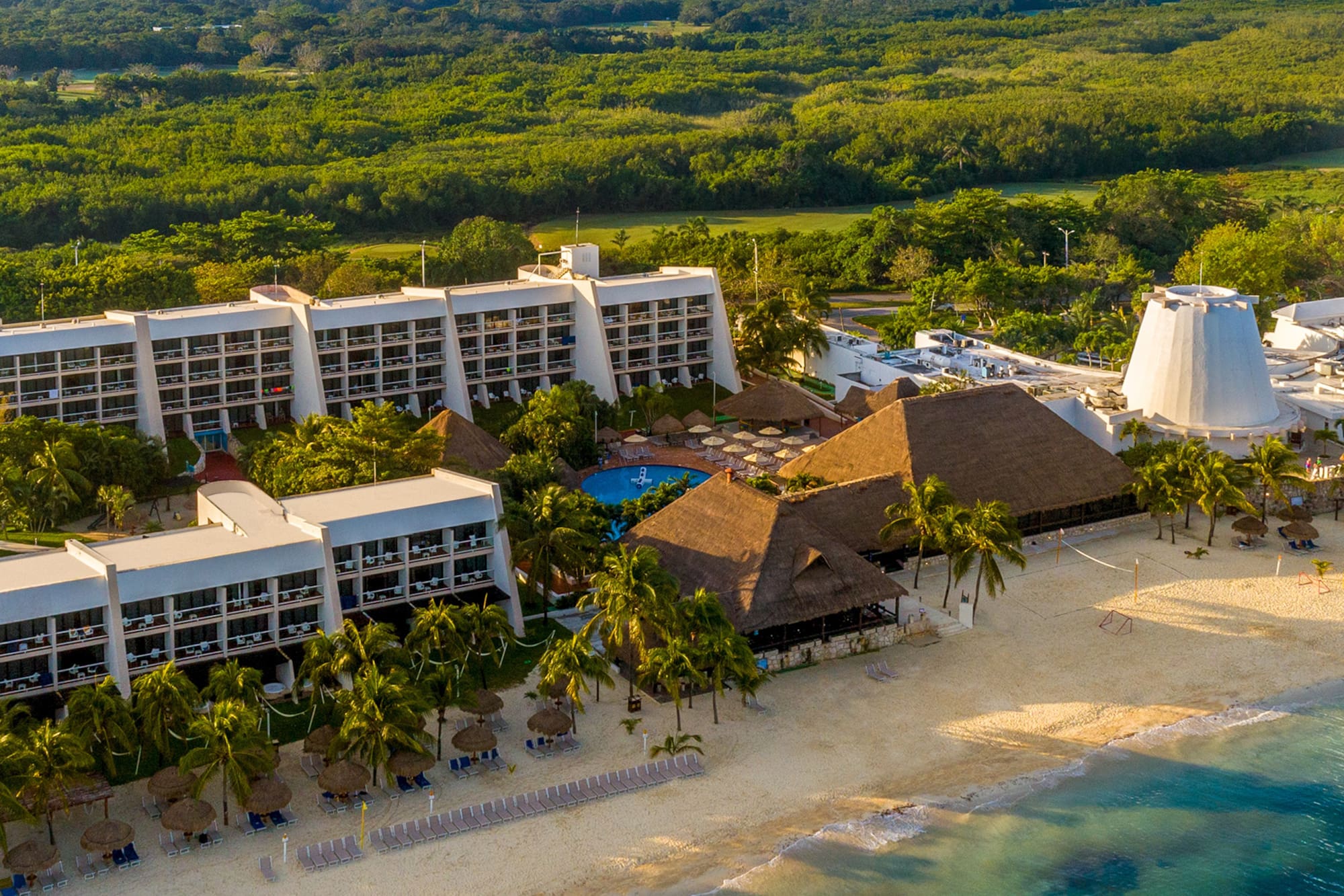 a resort with a pool and trees