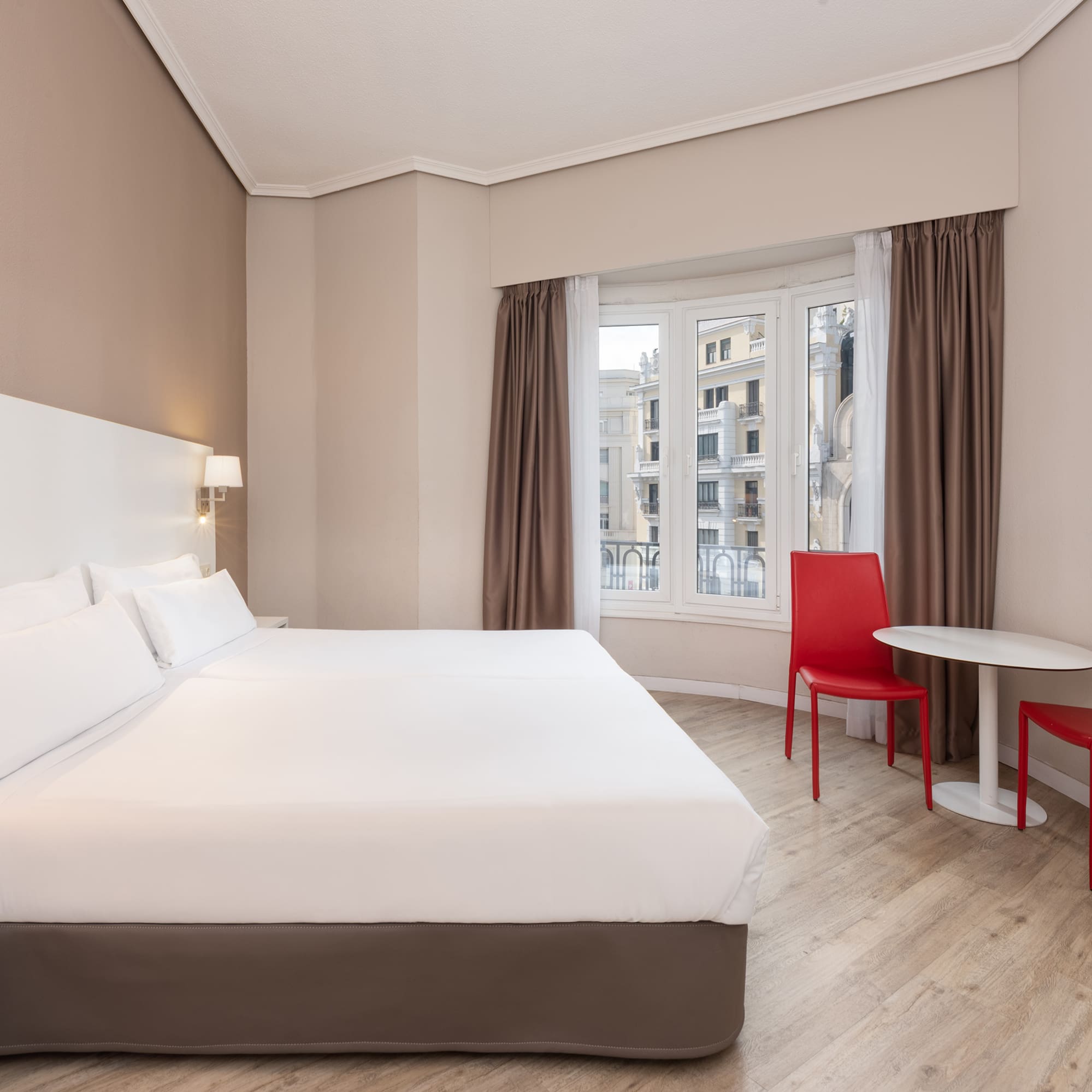 a room with a bed and a table