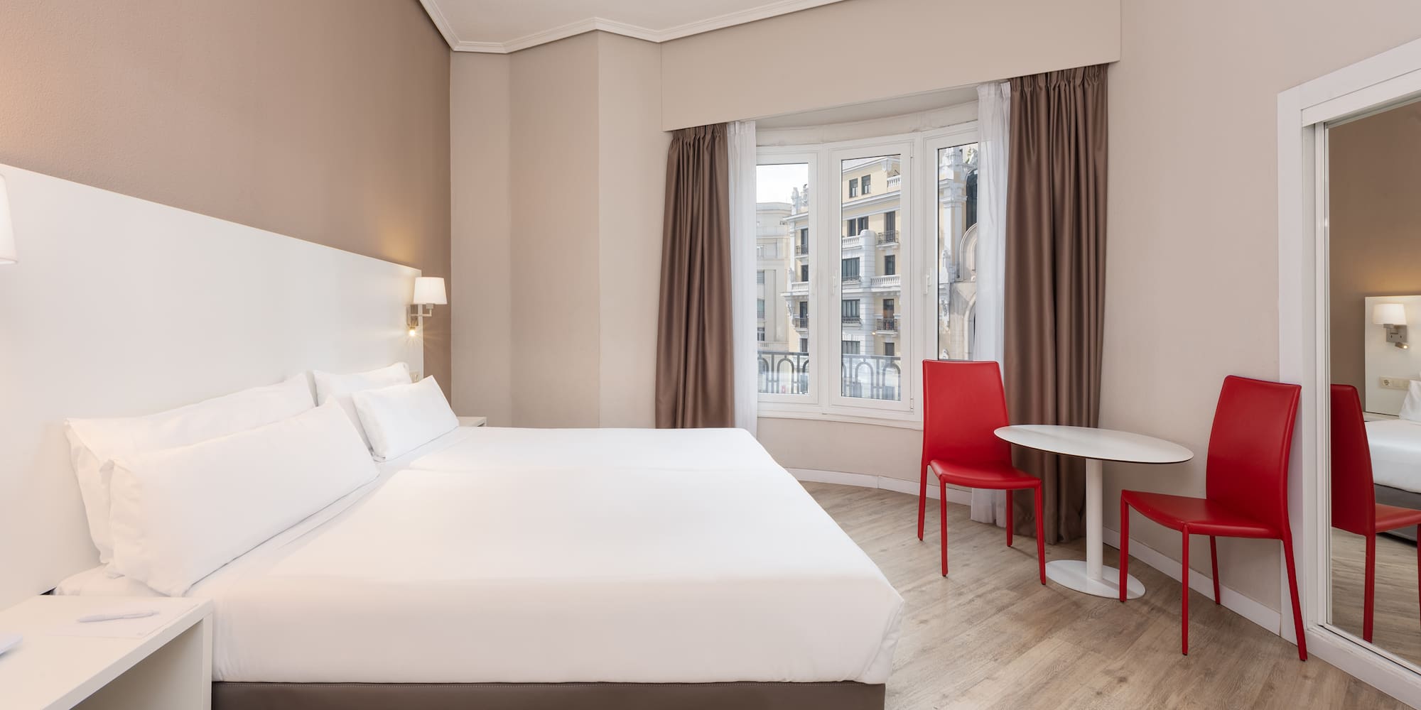 a room with a bed and a table