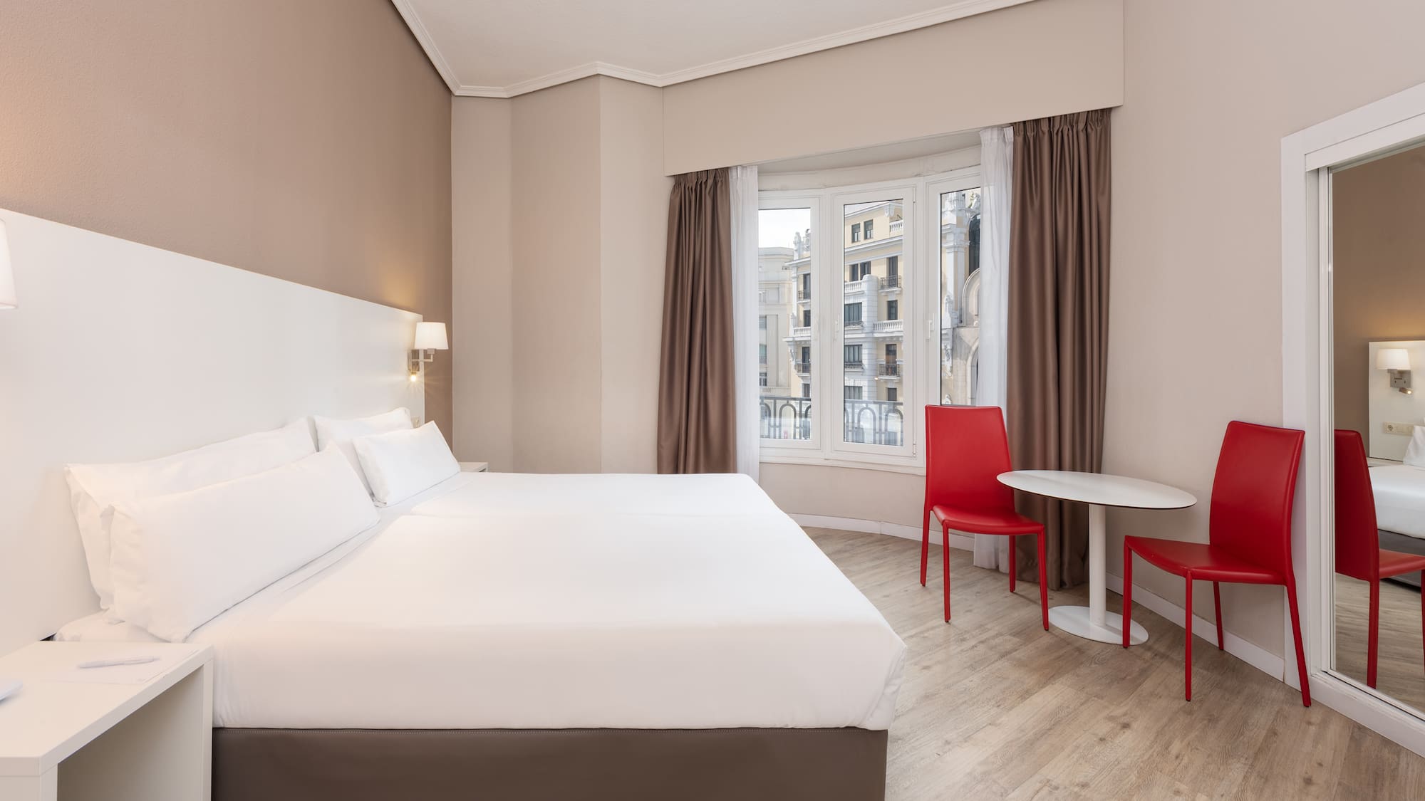 a room with a bed and a table