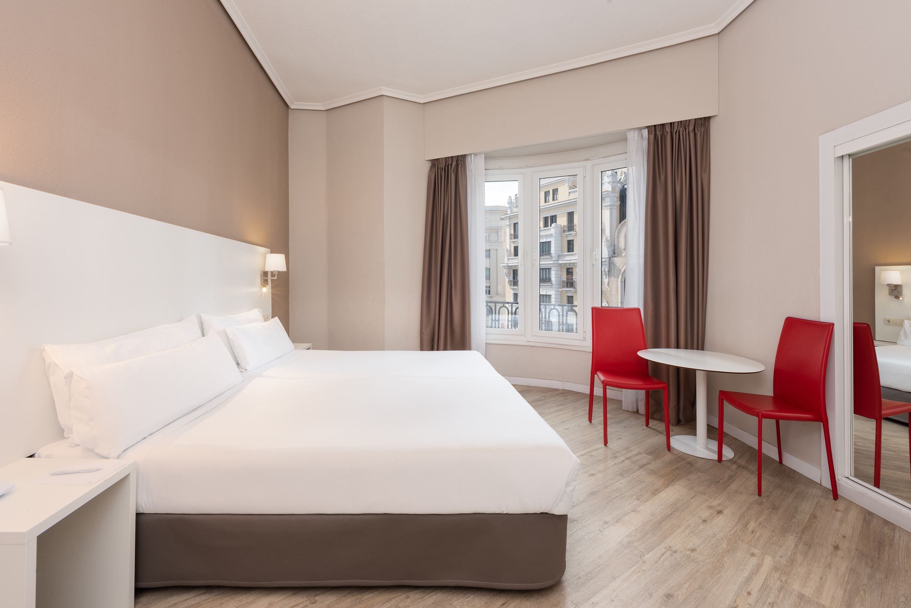 a room with a bed and a table